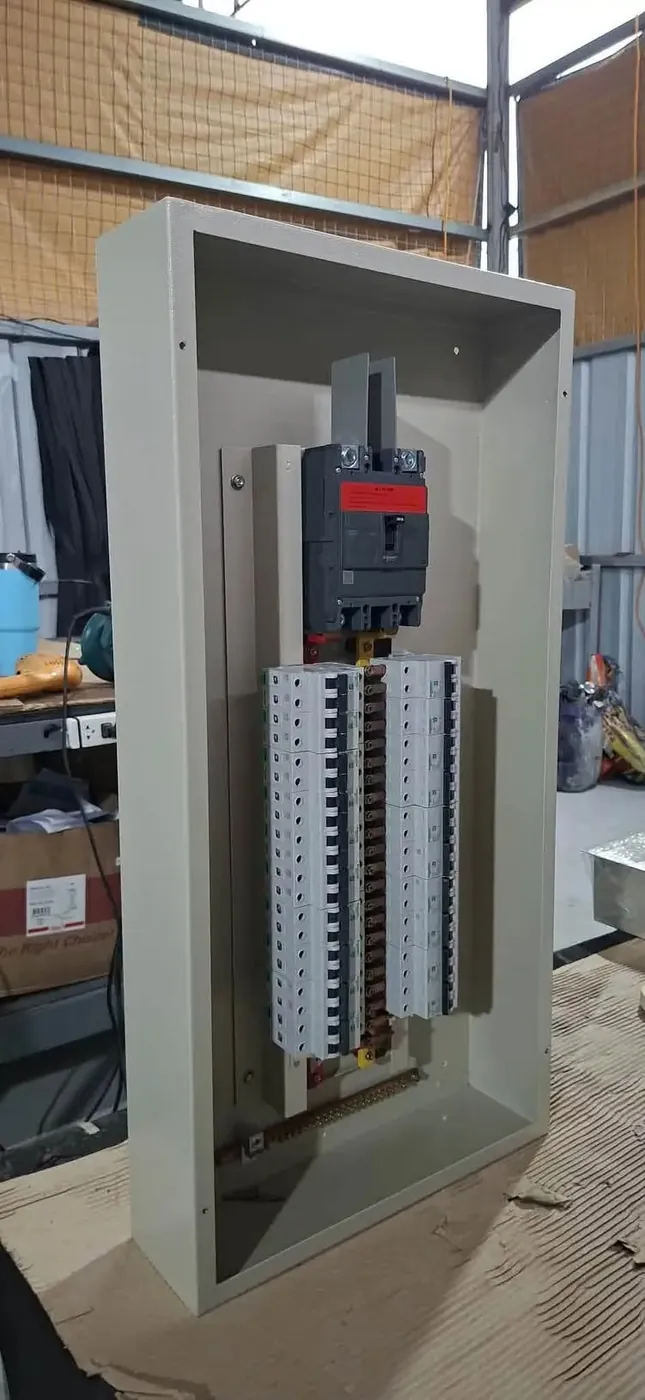 Distribution enclosure fitted with a main MCCB and rows of MCBs