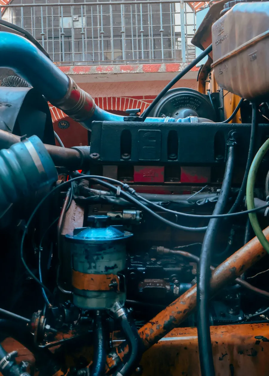 Close-up of a diesel engine with hoses, fuel filter and cabling